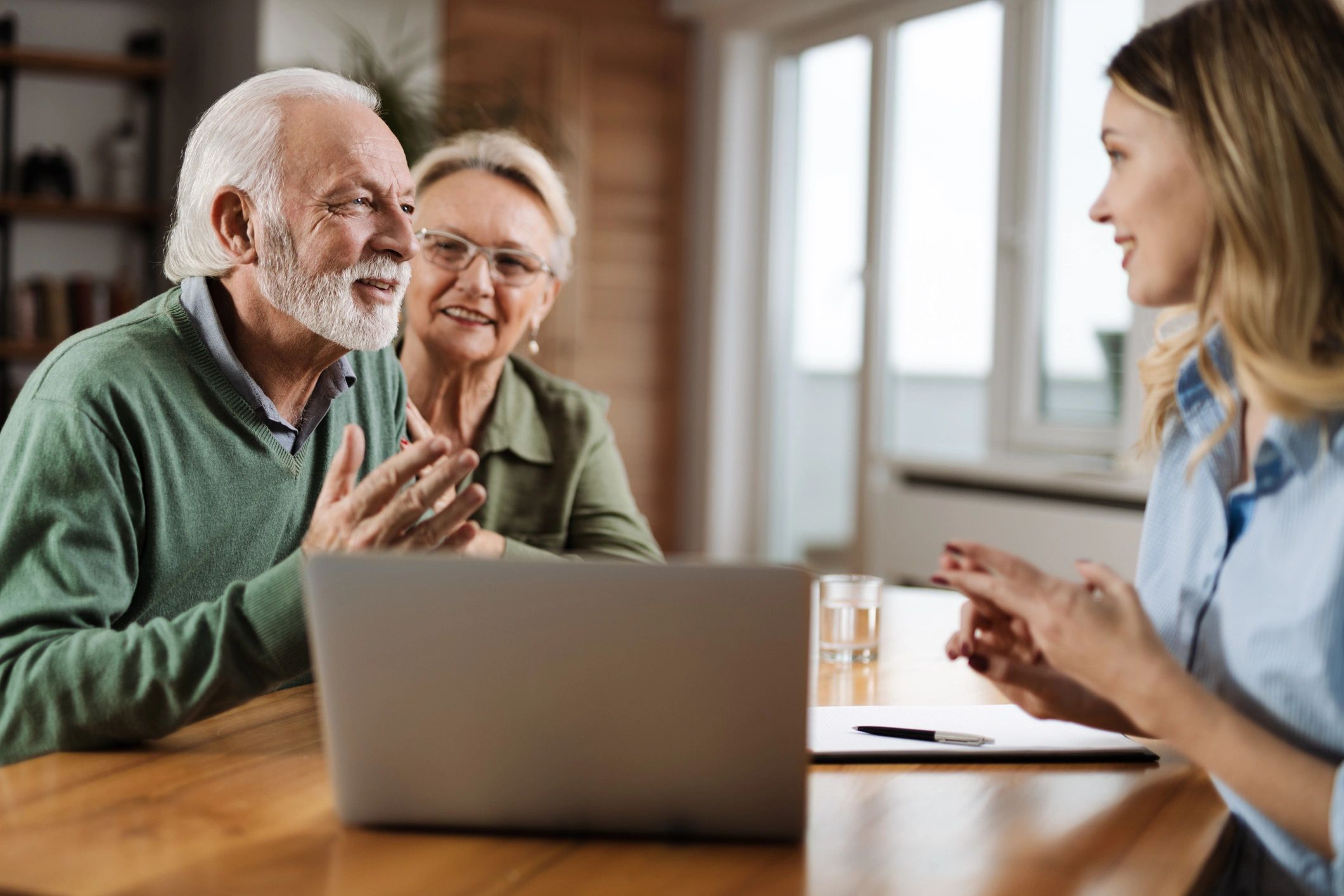professional Medicare advisor consulting with seniors